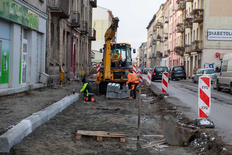 robotnicy pracujący przy ul. Struga